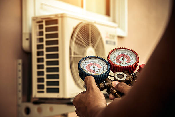 Professional Heat Pump Repair technician working in Ewan, NJ